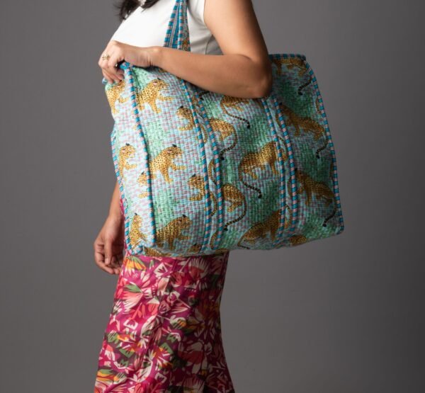 Pastel blue leopard print tote bag with zipper
